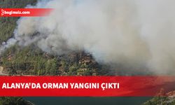 Antalya'da yerleşim yerlerine yakın ormanlık alanda çıkan yangına havadan ve karadan müdahale ediliyor