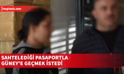 Sahtelediği pasaportla Güney'e geçmek istedi