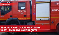 Elektrik kabloları kısa devre yaptı, ambarda yangın çıktı