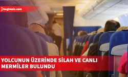 Ercan Havalimanı'nda bir yolcunun üzerinde silah ve canlı mermiler bulundu