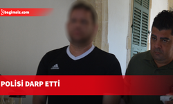 Havalimanında iki polisi darp etti