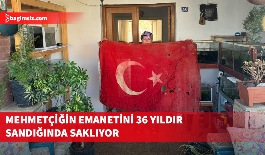 Kıbrıs Barış Harekatı'nda Mehmetçiğin kullandığı Türk bayrağını sandığında 36 yıldır saklıyor